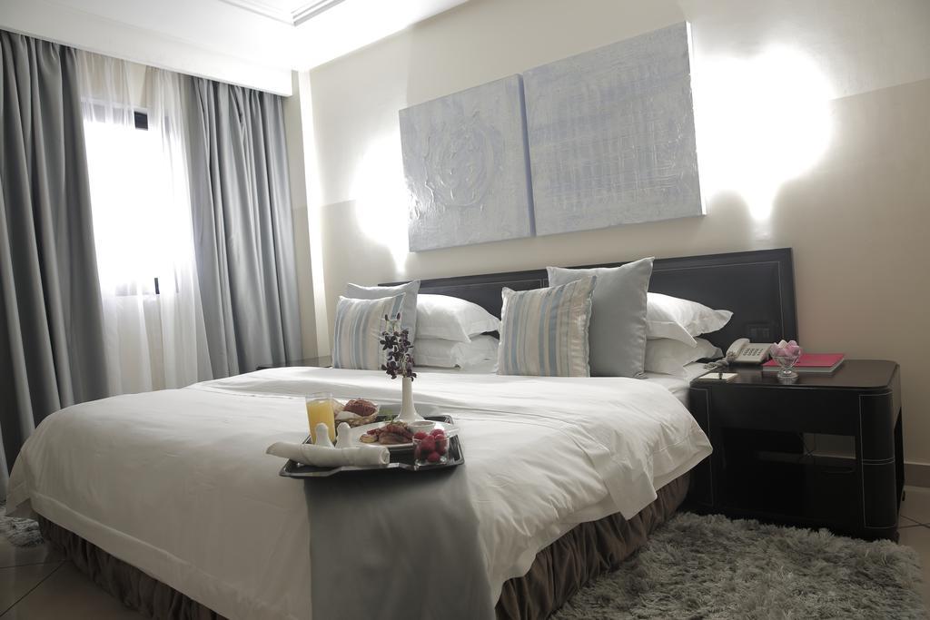 Oak Plaza Hotels East Airport Аккра Номер фото
